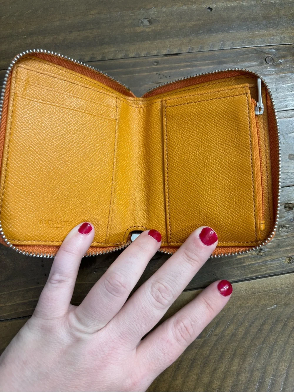 Coach Pebbled Leather Zip Wallet in Metallic Orange